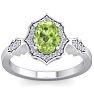 Peridot Ring: 1 1/2 Carat Oval Shape Peridot and Halo Diamond Ring In Sterling Silver Image-1