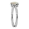 Opal Ring: 1 1/2 Carat Oval Shape Created Opal and Halo Diamond Ring In Sterling Silver Image-4