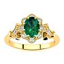 1 Carat Oval Shape Emerald and Halo Diamond Vintage Ring In 14 Karat Yellow Gold Image-1