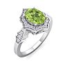 Peridot Ring: 1 1/2 Carat Oval Shape Peridot and Halo Diamond Ring In Sterling Silver Image-2