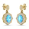 2 1/4 Carat Oval Shape Blue Topaz and Diamond Dangle Earrings In 14 Karat Yellow Gold Image-3