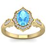 1 3/4 Carat Oval Shape Blue Topaz and Diamond Ring In 14 Karat Yellow Gold Image-1