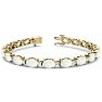 Opal Bracelet With 6 Carats of Oval Shape Opals and Diamonds In 14 Karat Yellow Gold, 7 Inches Image-1
