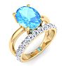 3 3/4 Carat Oval Shape Blue Topaz and Halo Diamond Ring Plus Band In 14 Karat Yellow Gold Image-2