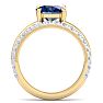 3.60 Carat Oval Shape Sapphire and Halo Diamond Ring Plus Band In 14 Karat Yellow Gold Image-3