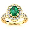 Estate Jewelry - 1/2 Carat Oval Shape Emerald and Halo Diamond Ring In 14 Karat Yellow Gold, Size 7.5 Image-1