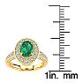 Estate Jewelry - 1/2 Carat Oval Shape Emerald and Halo Diamond Ring In 14 Karat Yellow Gold, Size 7.5 Image-5