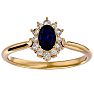 3/4 Carat Oval Shape Sapphire and Halo Diamond Ring In 14 Karat Yellow Gold Image-1