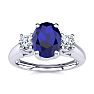 1 1/5 Carat Oval Shape Sapphire and Two Diamond Ring In 14 Karat White Gold Image-1