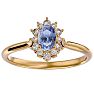 2/3 Carat Oval Shape Tanzanite and Halo Diamond Ring In 14 Karat Yellow Gold Image-1