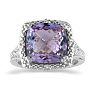 You will not believe this gorgeous  amethyst and diamond ring. Crafted in sterling silver and containing an appley green 4 carat total amethyst and diamonds.  The diamond content is .04 carat in J/K color and I2 clarity.  One Star diamonds. Image-1