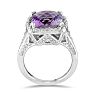 You will not believe this gorgeous  amethyst and diamond ring. Crafted in sterling silver and containing an appley green 4 carat total amethyst and diamonds.  The diamond content is .04 carat in J/K color and I2 clarity.  One Star diamonds. Image-3