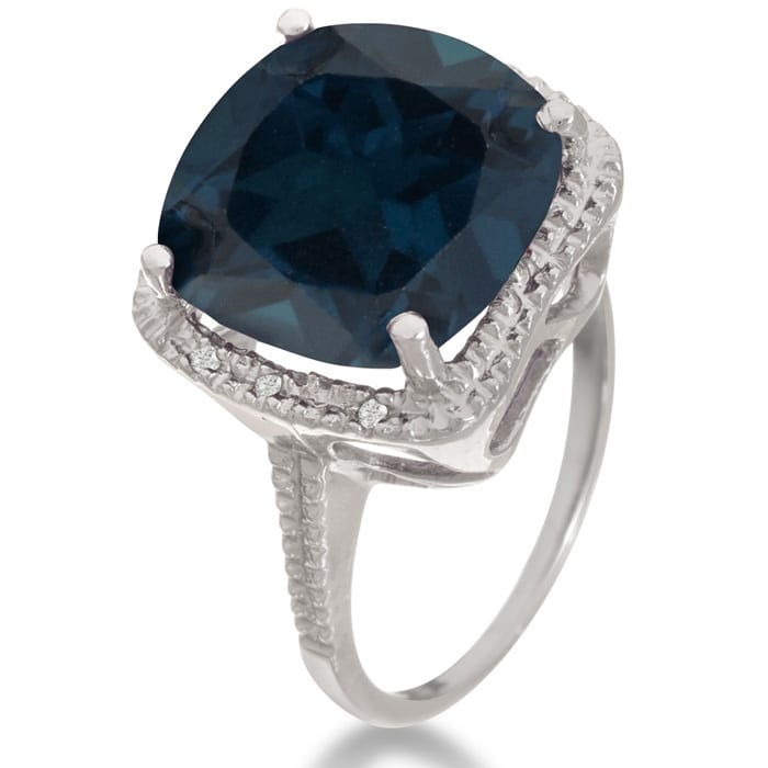 For a trendy statement ring, try this huge sapphire and diamond right hand ring.  Total gem weight is 7 carats and diamond content is .03 carats in J/K color, I3 clarity.