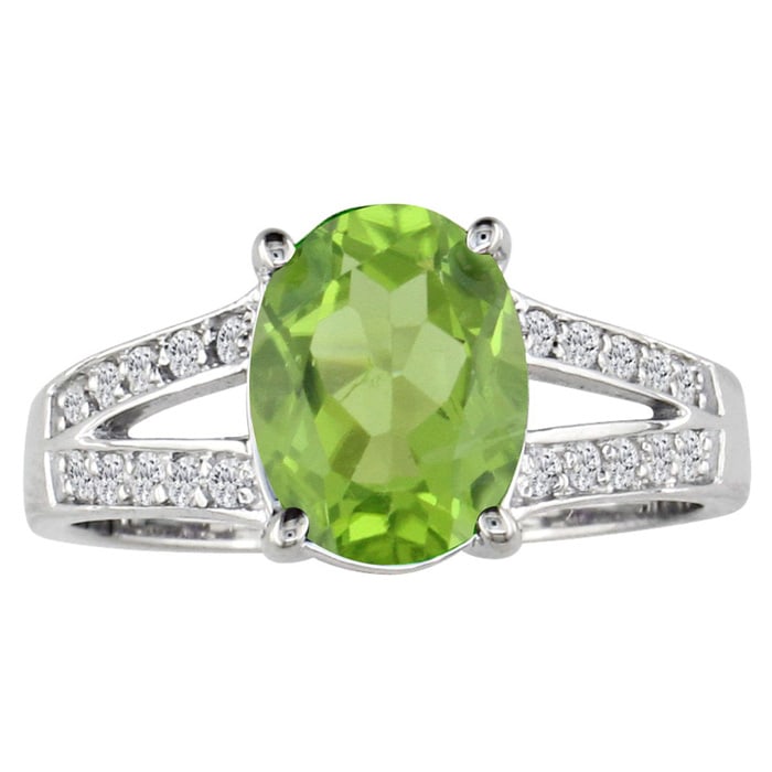 Split band  2 1/4ct Oval Peridot and Diamond Gemstone Ring. 20 diamonds totaling .20ct.  Gorgeous diamonds, fine deep color.