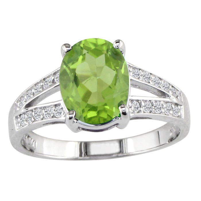 Split band  2 1/4ct Oval Peridot and Diamond Gemstone Ring. 20 diamonds totaling .20ct.  Gorgeous diamonds, fine deep color.