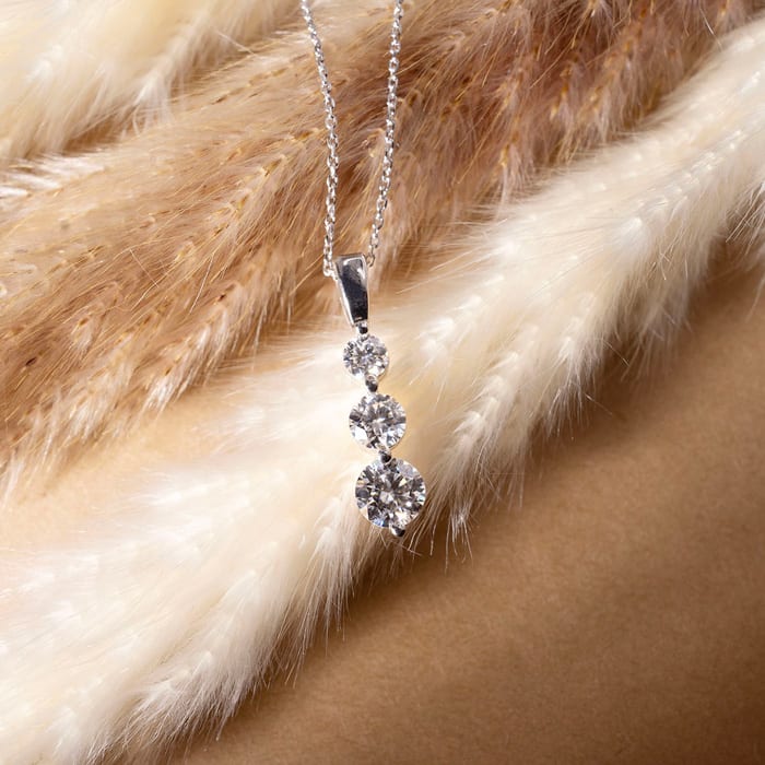 1 1/2ct Three Diamond Drop Style Diamond Pendant In 14k White Gold.