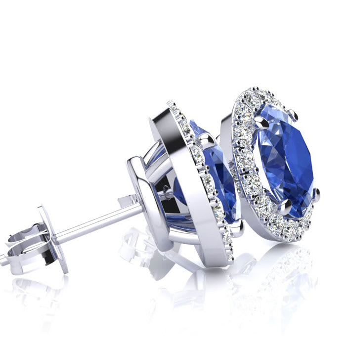 1 1/4 Carat Oval Shape Tanzanite and Halo Diamond Stud Earrings In 14 Karat White Gold