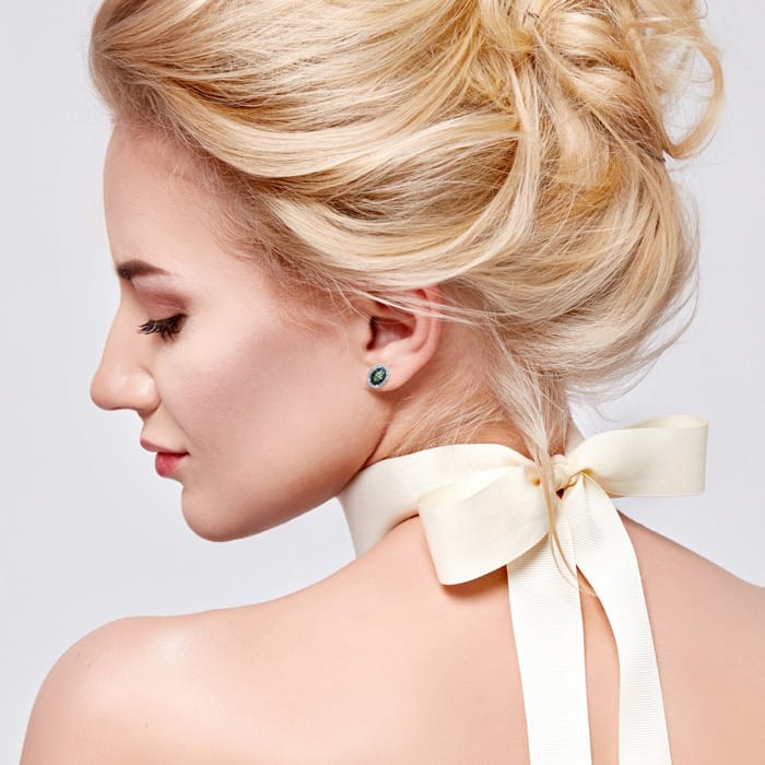 2 1/4 Carat Oval Shape Mystic Topaz and Halo Diamond Stud Earrings In 14 Karat White Gold