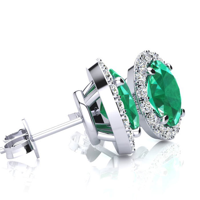 2 1/2 Carat Oval Shape Emerald and Halo Diamond Stud Earrings In 14 Karat White Gold