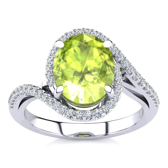 2 3/4 Carat Oval Shape Peridot and Halo Diamond Ring In 14 Karat White Gold