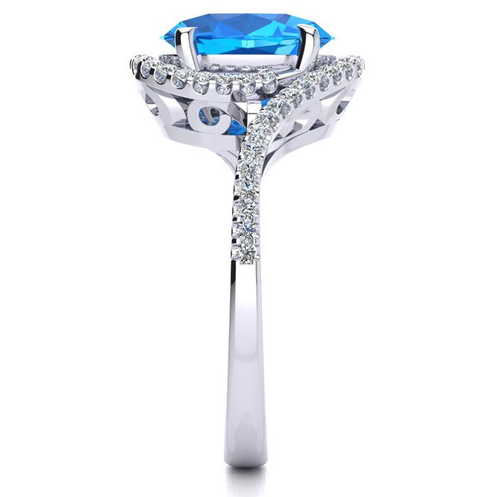 3 1/2 Carat Oval Shape Blue Topaz and Halo Diamond Ring In 14 Karat White Gold
