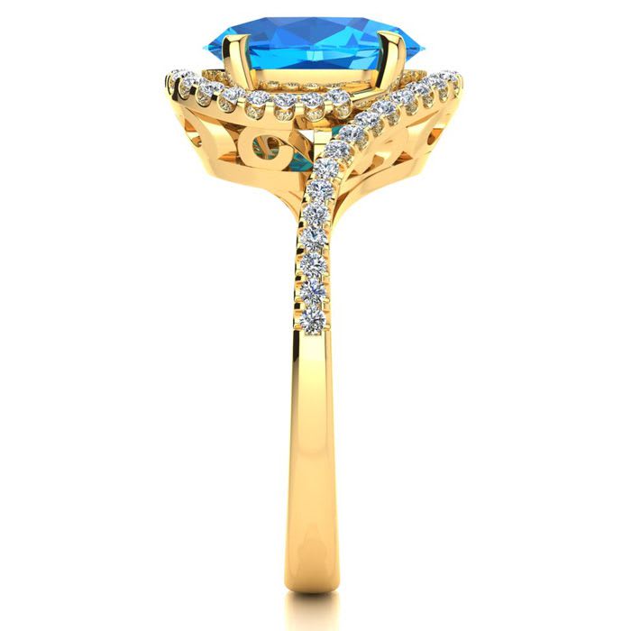 3 1/2 Carat Oval Shape Blue Topaz and Halo Diamond Ring In 14 Karat Yellow Gold