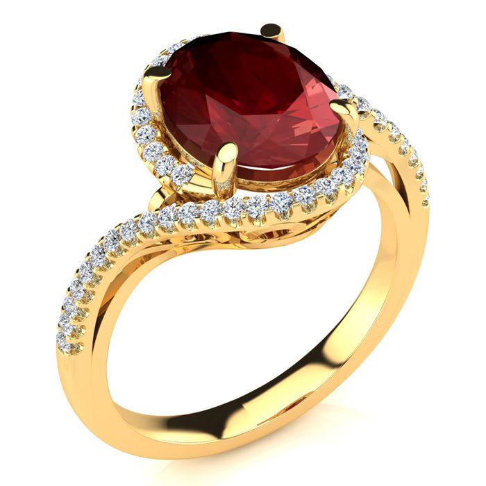 3 1/3 Carat Oval Shape Ruby and Halo Diamond Ring In 14 Karat Yellow Gold