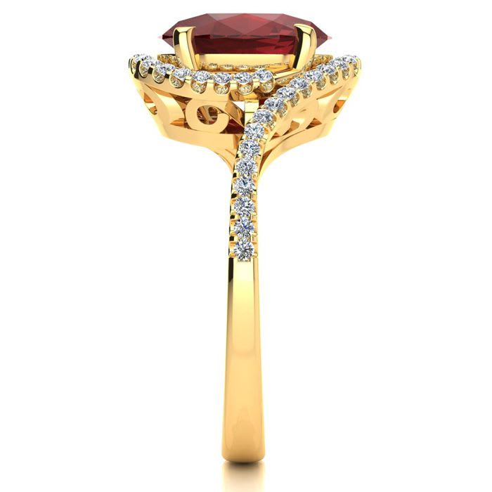 3 1/3 Carat Oval Shape Ruby and Halo Diamond Ring In 14 Karat Yellow Gold