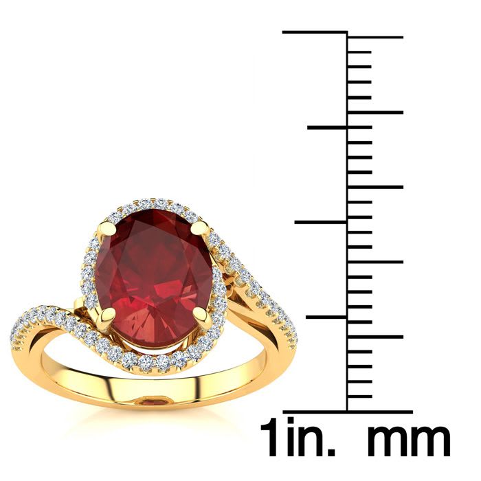 3 1/3 Carat Oval Shape Ruby and Halo Diamond Ring In 14 Karat Yellow Gold