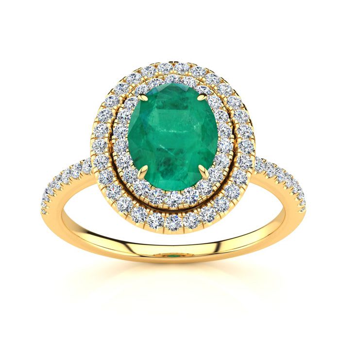 1 1/2 Carat Oval Shape Emerald and Double Halo Diamond Ring In 14 Karat Yellow Gold
