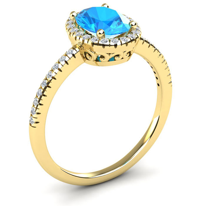 1 3/4 Carat Oval Shape Blue Topaz and Halo Diamond Ring In 14 Karat Yellow Gold