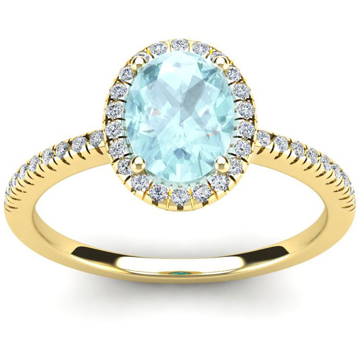 Aquamarine Ring: Aquamarine Jewelry: 1 1/3 Carat Oval Shape Aquamarine and Halo Diamond Ring In 14 Karat Yellow Gold