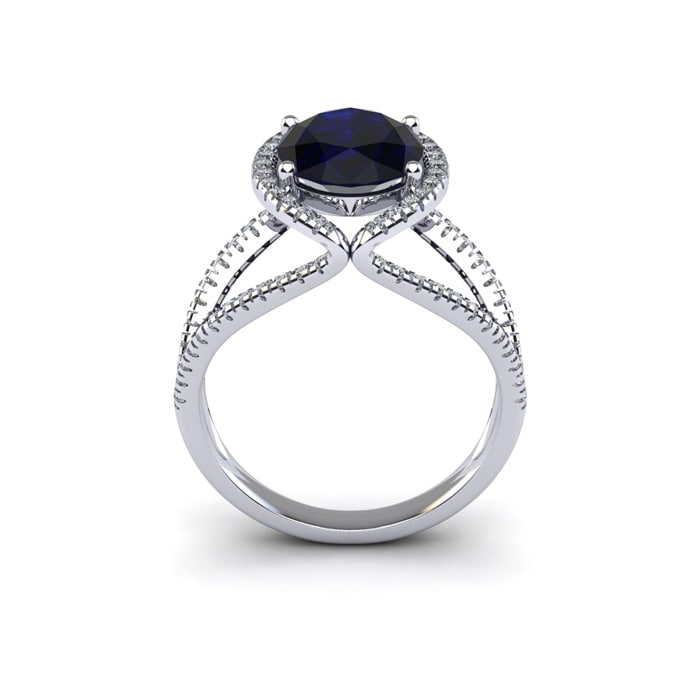 3 1/2 Carat Oval Shape Sapphire and Halo Diamond Ring In 14 Karat White Gold