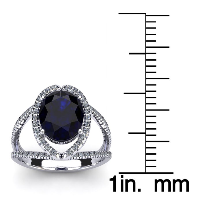 3 1/2 Carat Oval Shape Sapphire and Halo Diamond Ring In 14 Karat White Gold