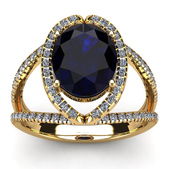 3 1/2 Carat Oval Shape Sapphire and Halo Diamond Ring In 14 Karat Yellow Gold