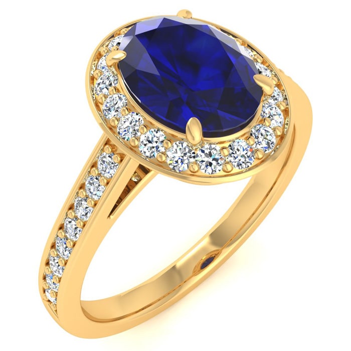 1 3/4 Carat Oval Shape Sapphire and Halo Diamond Ring In 14 Karat Yellow Gold