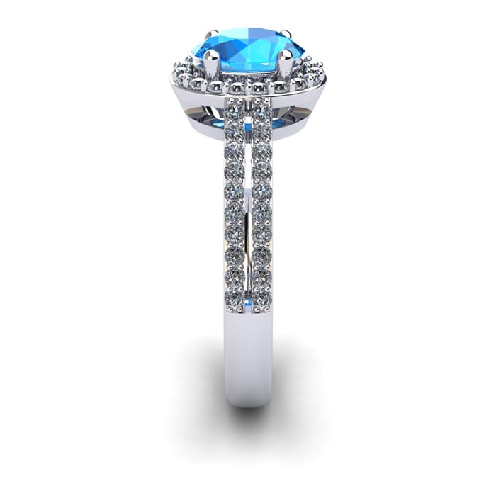 1 1/2 Carat Oval Shape Blue Topaz and Halo Diamond Ring In 14 Karat White Gold