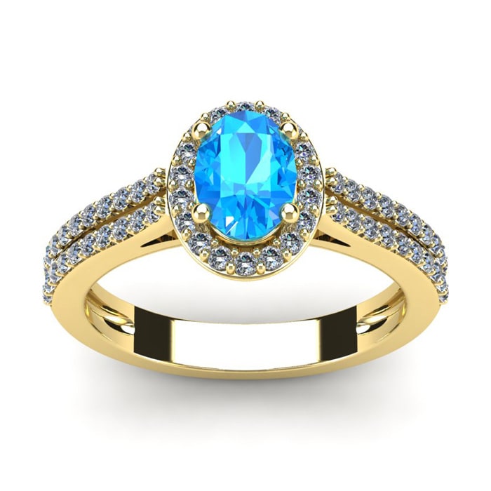 1 1/2 Carat Oval Shape Blue Topaz and Halo Diamond Ring In 14 Karat Yellow Gold