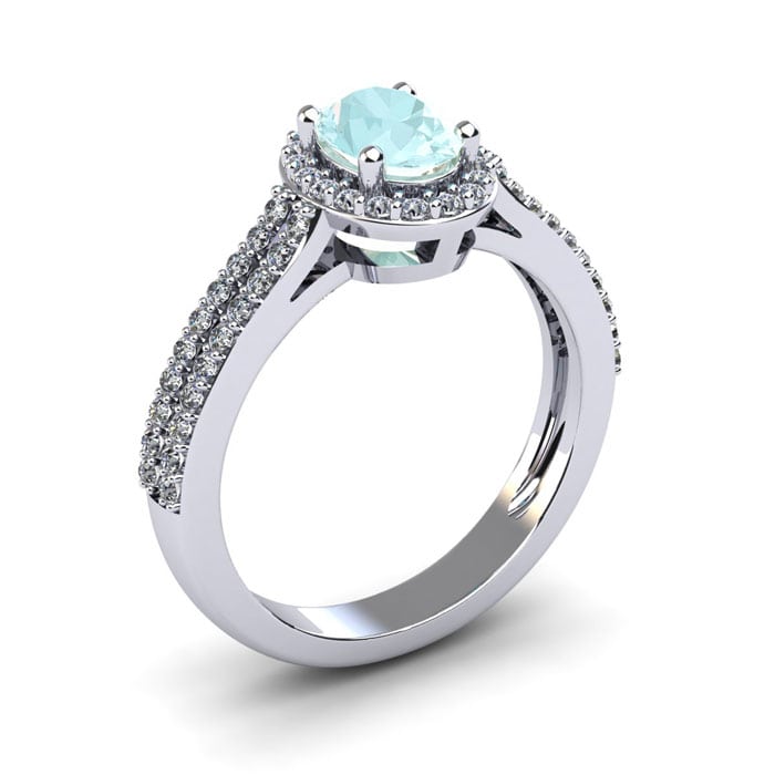 Aquamarine Ring: Aquamarine Jewelry: 1 1/4 Carat Oval Shape Aquamarine and Halo Diamond Ring In 14 Karat White Gold