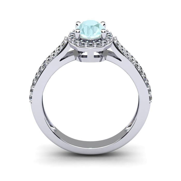 Aquamarine Ring: Aquamarine Jewelry: 1 1/4 Carat Oval Shape Aquamarine and Halo Diamond Ring In 14 Karat White Gold