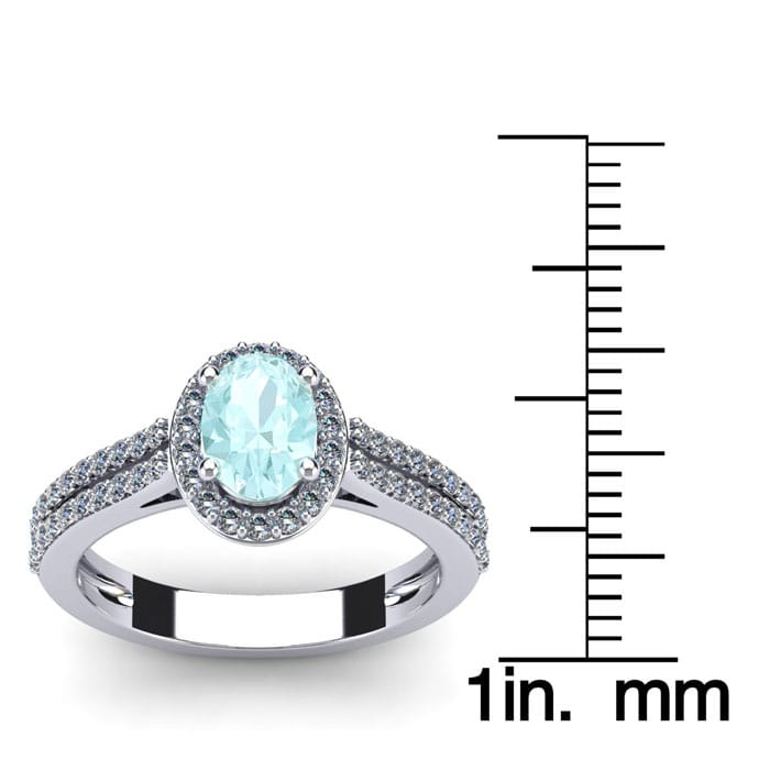 Aquamarine Ring: Aquamarine Jewelry: 1 1/4 Carat Oval Shape Aquamarine and Halo Diamond Ring In 14 Karat White Gold