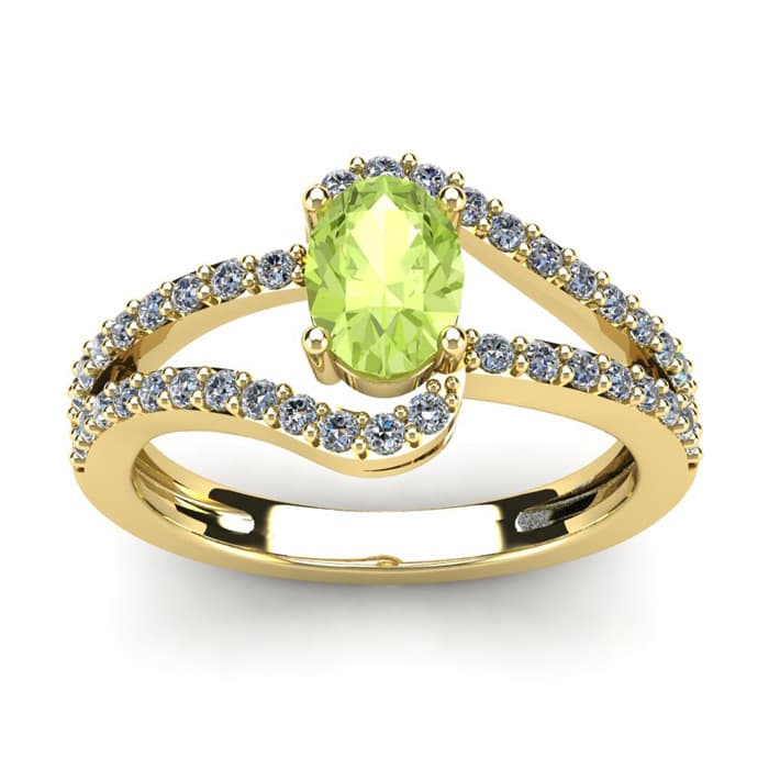 1 1/3 Carat Oval Shape Peridot and Fancy Diamond Ring In 14 Karat Yellow Gold