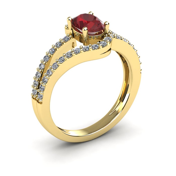 Garnet Ring: Garnet Jewelry: 1 1/2 Carat Oval Shape Garnet and Fancy Diamond Ring In 14 Karat Yellow Gold