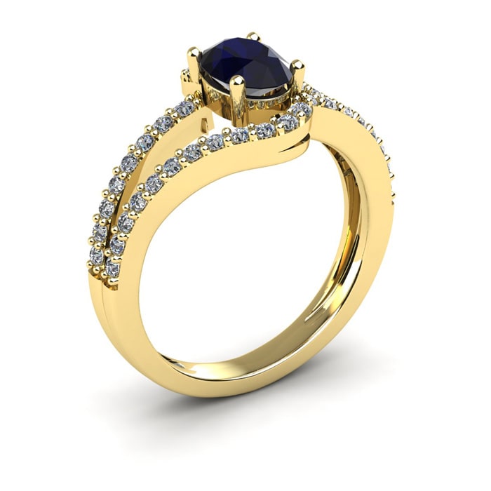 1 1/2 Carat Oval Shape Sapphire and Fancy Diamond Ring In 14 Karat Yellow Gold