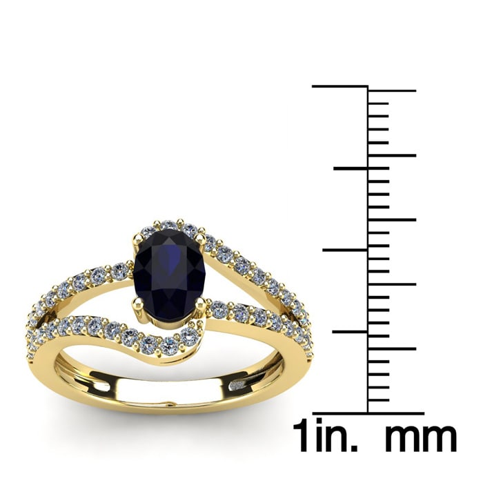 1 1/2 Carat Oval Shape Sapphire and Fancy Diamond Ring In 14 Karat Yellow Gold