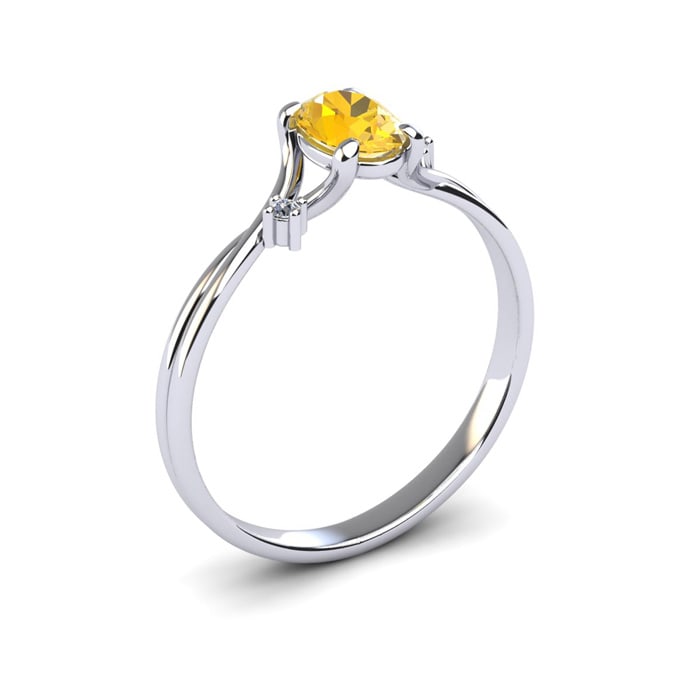 1/2 Carat Oval Shape Citrine and Two Diamond Accent Ring In 14 Karat White Gold