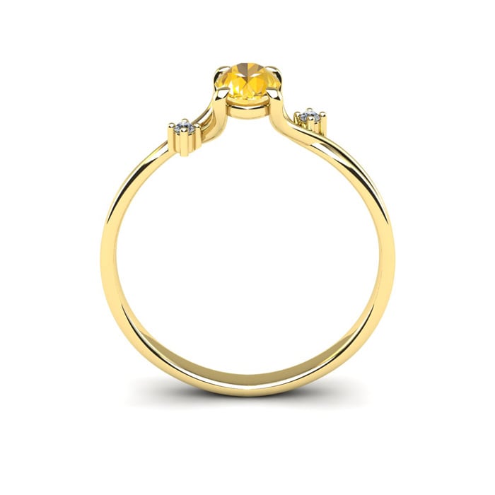 1/2 Carat Oval Shape Citrine and Two Diamond Accent Ring In 14 Karat Yellow Gold