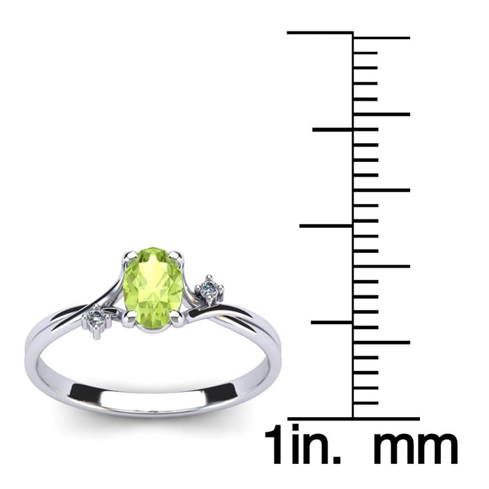 1/2 Carat Oval Shape Peridot and Two Diamond Accent Ring In 14 Karat White Gold