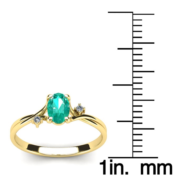 1/2 Carat Oval Shape Emerald and Two Diamond Accent Ring In 14 Karat Yellow Gold