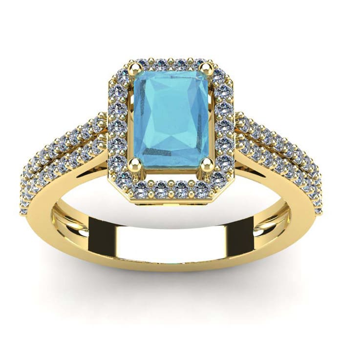 Aquamarine Ring: Aquamarine Jewelry: 1 1/3 Carat Aquamarine and Halo Diamond Ring In 14 Karat Yellow Gold